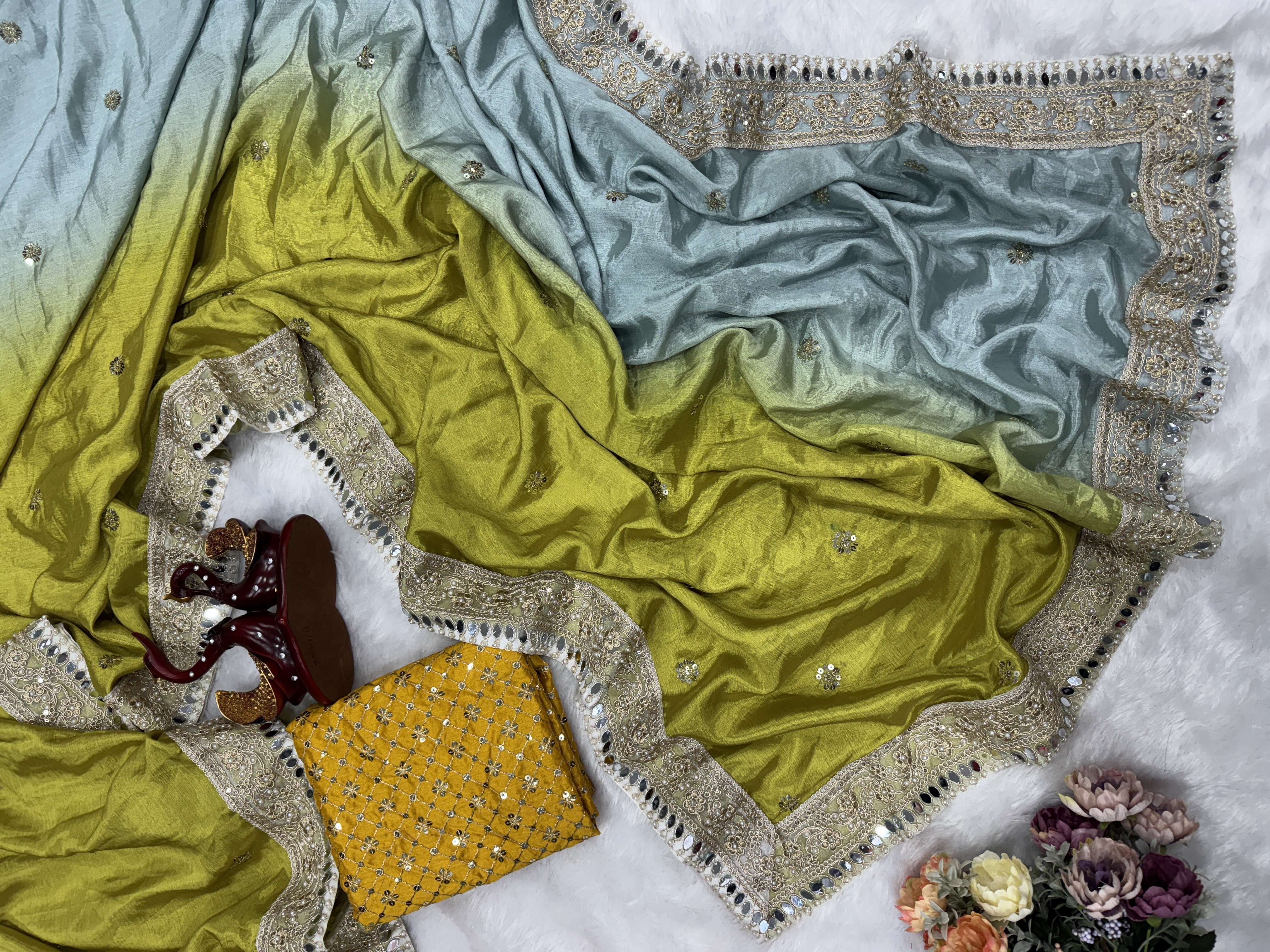 Shaded in beautiful color in soft chinnon fancy fabric saree wholesale in surat 5522